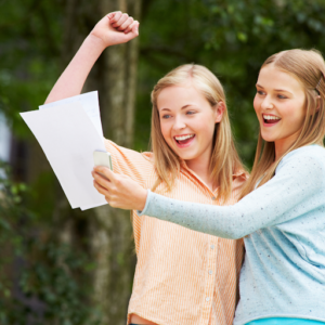2 young ladies celebrating successes
